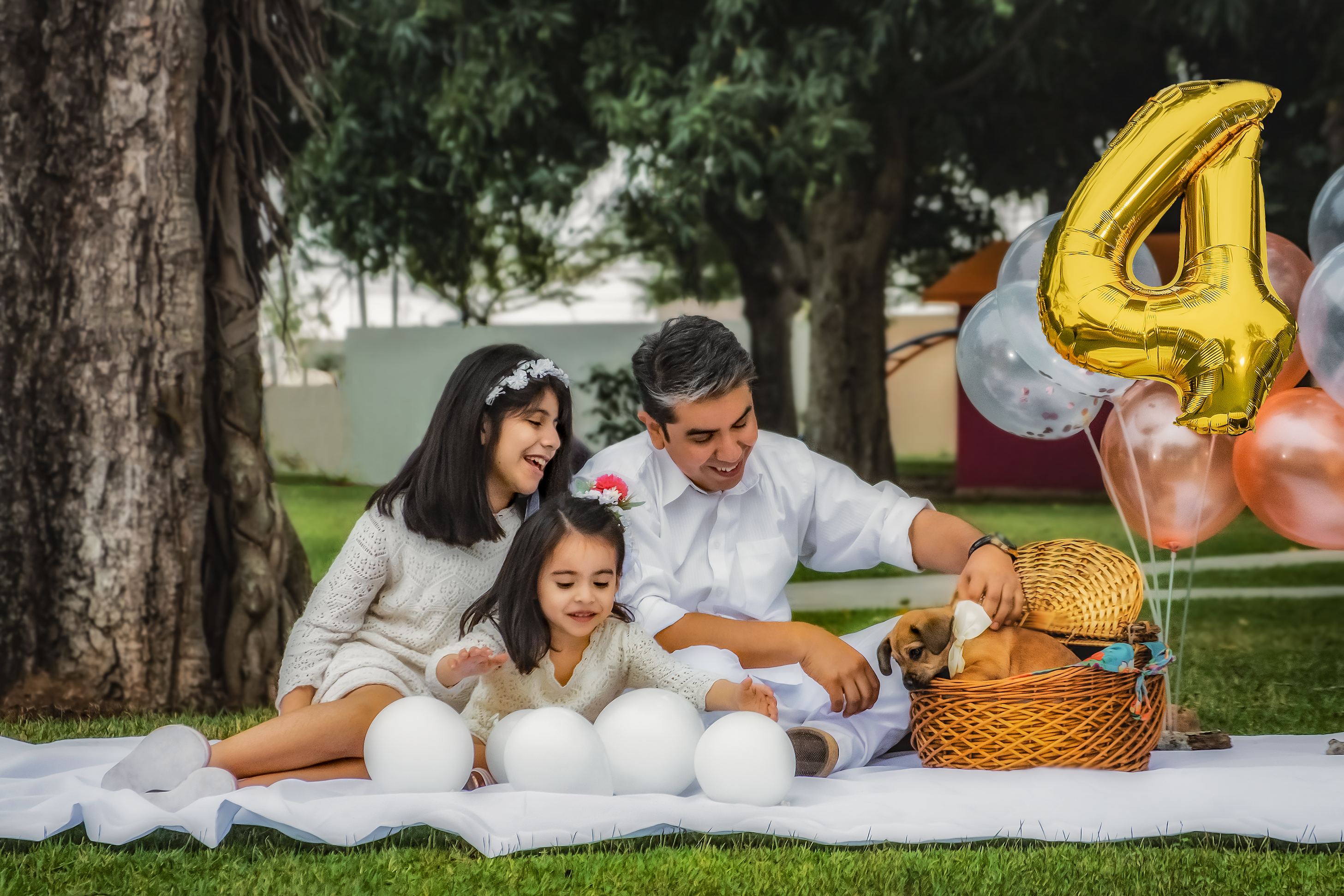 Family Sitting on White Round Table